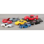 A collection of Ford and Porsche scale models, to include Maisto examples, Porsche 911 and Carrera