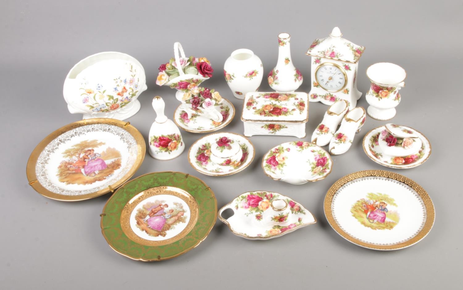 A quantity of mainly Royal Albert Old Country Roses to include quartz clock, bell, posy vase etc.