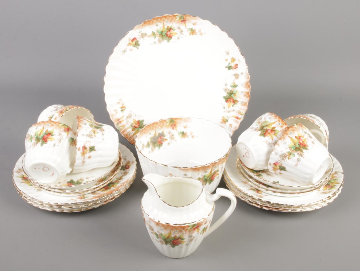 A late Victorian Chapman teaset, decorated with flowers. Minor chips to plates.