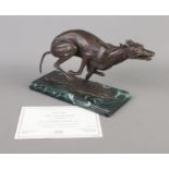 A Danbury Mint sculpture entitled The Greyhound by Ann Richmond with certificate of authenticity.