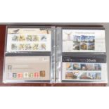 An album of Royal Mail first day covers. Including Star Wars, Beatrix Potter, David Bowie, Harry