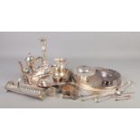 A collection of silver plated items. Includes trays, coaster, napkin rings etc.