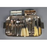 A tray of assorted cutlery including silver handled, silver plate and stainless steel examples.