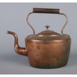 A nineteenth century copper kettle, with dovetail joints to body and base. 29cm high including