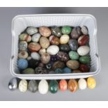 A box of hardstone eggs. Including agate examples, etc.