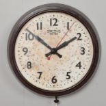 A Smiths Sectric Bakelite circular electric wall clock. Diameter: 34cm. Chip to the bakelite at