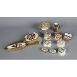 A quantity of ceramic trinket boxes including perfume bottle miniature casket, brush and mirror