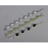 Three silver bracelets set with gemstone cabochons including moonstone example. Good condition.