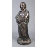 A large bronze figure of a young maiden carrying crops. (44cm)