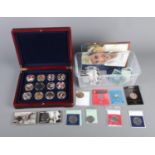 A quantity of commemorative coins including WWI Kings Shilling, Silver Jubilee Crown, Kennedy