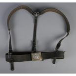 A pair of German WWII braces with belt buckle.