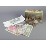 A quantity of world coins and bank notes including US, Danish, Japanese and French examples, etc.