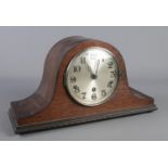 A mahogany cased dome top mantel clock. The movement marked for Haller.