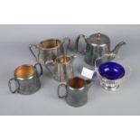 A quantity of silver plate including jugs and teapot.