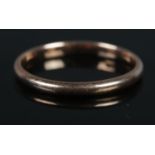 A 9ct Rose Gold wedding band. Size P. Total weight: 1.61g.