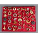 A quantity of costume jewellery brooches (approximately forty-five). To include 'Mother, 'Gemini'