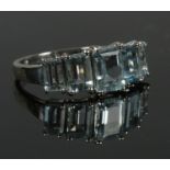 A 9ct white gold aquamarine 5 stone ring, size M. 2.42g.