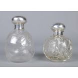 Two silver topped globular scent bottles; one stamped for Birmingham, 1938, by Mappin and Webb (