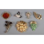 A collection of vintage designer costume brooches. To include examples from Monet, Napier, Suzanne