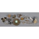 A small assortment of costume jewellery brooches. To include wirework, pheasants foot and