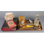 A good quantity of collectables, to include leather bound bible, plated cruet set, carving sets,