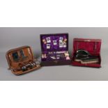 A sewing kit featuring mother of pearl tools, boxed Ebony vanity set and vintage gents grooming