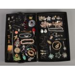 A good collection of costume jewellery. To include Christmas brooches, earrings, bracelets and