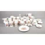 A box of assorted ceramics include commemorative mugs, Hammersley milk jug, Shelley, etc.