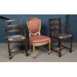 A pair of carver dining chairs, together with a gilt occasional 'throne' chair, for repair.