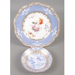 Two antique pieces of Spode bone china. Includes cabinet plate with painted floral panel and blue