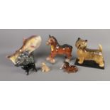 A collection of ceramic animals including Beswick foal, Jenna Holland Lustre Fish, large terrier,