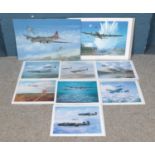 A collection of pictures and prints depicting planes at war, including Dambusters example. Prints