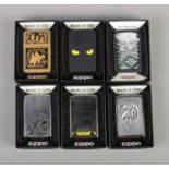 Six vintage Zippo used lighters in original boxes including Harley Davidson, New York Taxi,