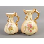Two Royal Worcester blushware jugs, in the 1507 shape. Dated 1907 and 1912. Tallest: 21cm. No