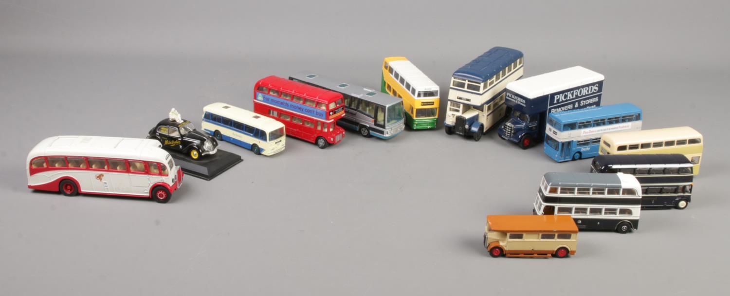 Thirteen loose die-cast vehicles, including examples from Corgi, Exclusive First Editions and Dinky.