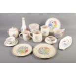 A collection of Poole pottery including tankards, milk jugs, plates etc. Approx. 14 pieces.