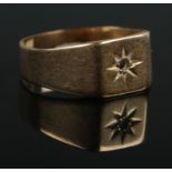 An 18ct Gold signet ring, set with central star. Size SÂ½. Weight: 3.6g Stone missing.