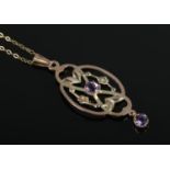 An Edwardian 9ct Gold and Amethyst pendant, on 9ct Gold chain. Total weight: 2g