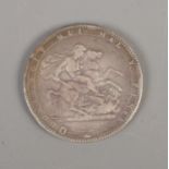 A George III silver crown dated 1819.