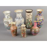 A quantity of oriental vases in varying size. 7 pieces. Small cylindrical vase with nibble to rim.