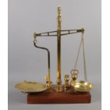 A set of Day and Millward balance scales, complete with a harlequin set of weights, including