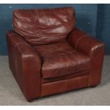 A brown leather sofa by The Vintage Tanning Company by Halo. Some tears to webbing on back rest