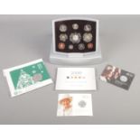 A quantity of coins. Including Royal Mint 2000 United Kingdom Proof Set Coins for the New