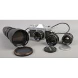 Four pieces of camera equipment. Including large Titan lens, Mamiya/Sekor 500DTL SLR camera, etc.