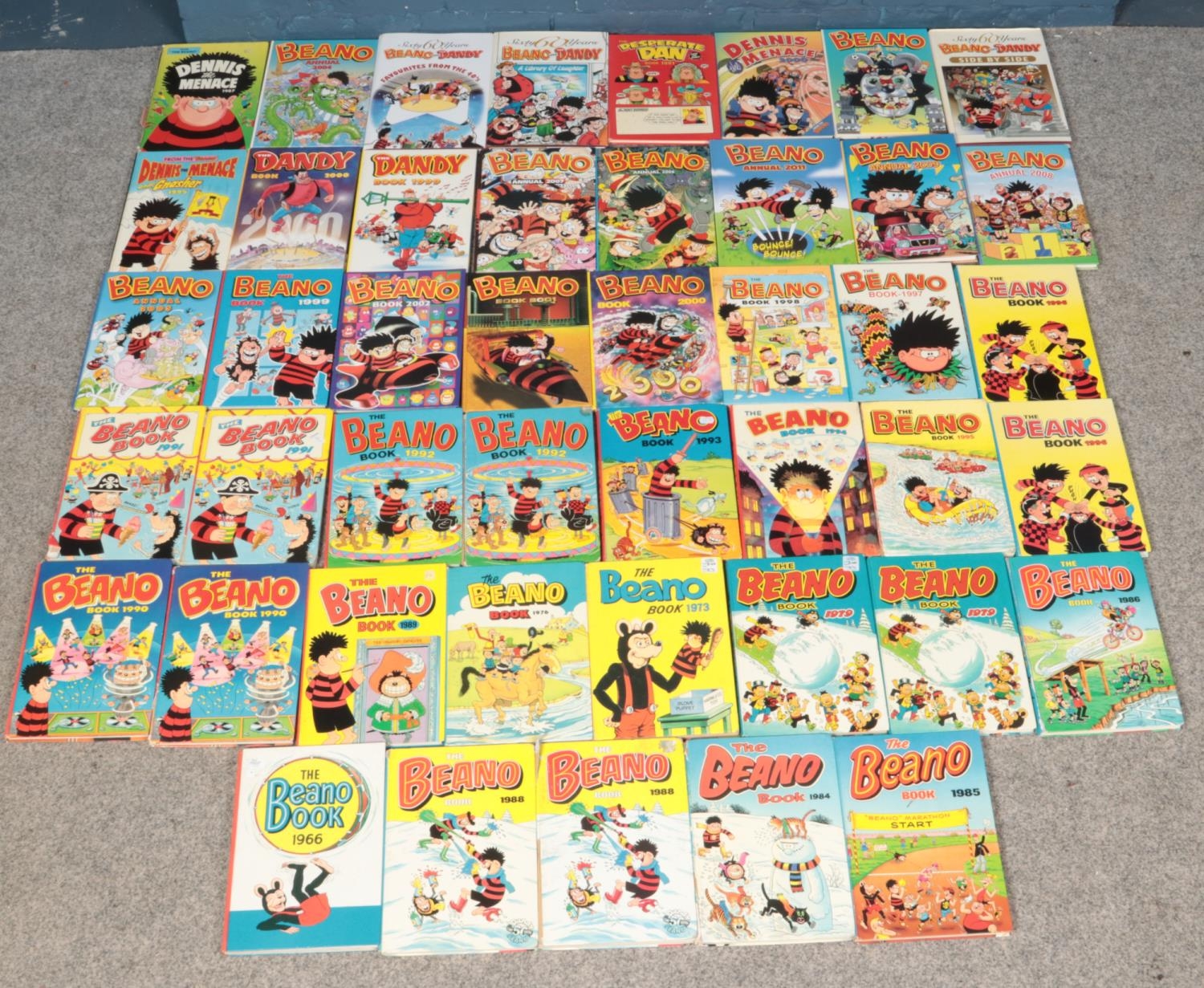 A box of Beano and Dandy annuals. Including 1966 Beano, 1970s and 90s examples, etc.