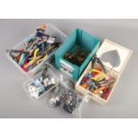 Four boxes of watch and jewellery tools. Includes watch and clock parts.