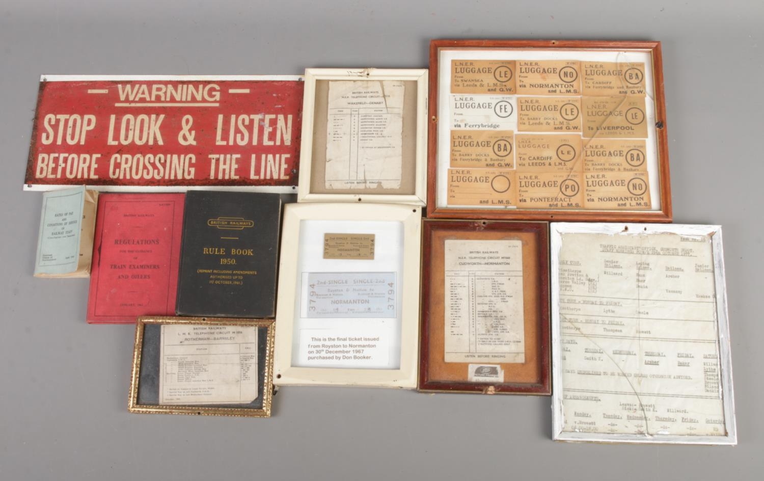 A collection of railway tickets, books, leaflets and signage, including luggage tickets and the last