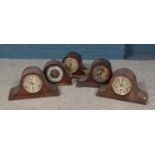 Five wooden cased mantel clocks. Mostly in need of repair or attention.