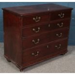 A Georgian mahogany chest of two over three drawers. (82cm x 97cm) Some staining to top. Slight chip