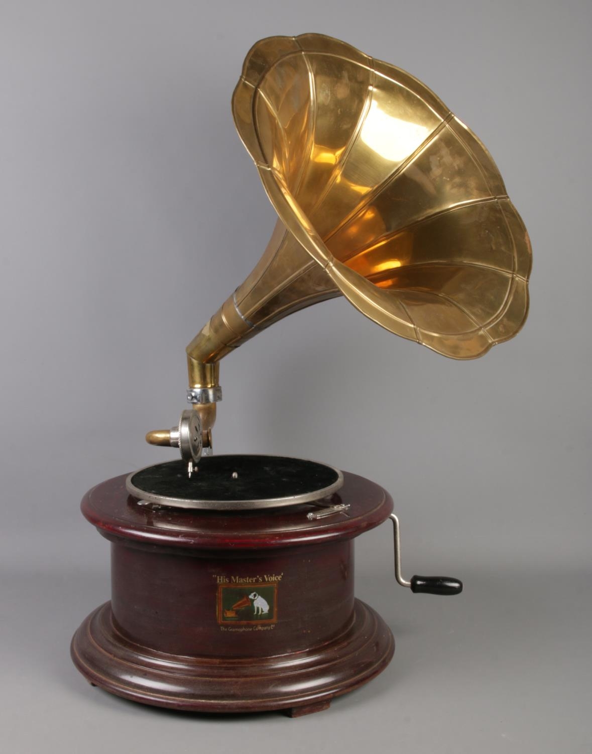 Two Vintage 'His Masters Voice' wooden gramophones on circular bases. Both with brass funnels, one - Image 3 of 3